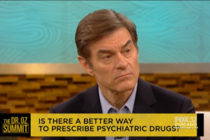 Dr. Oz discussing mental health with another woman
