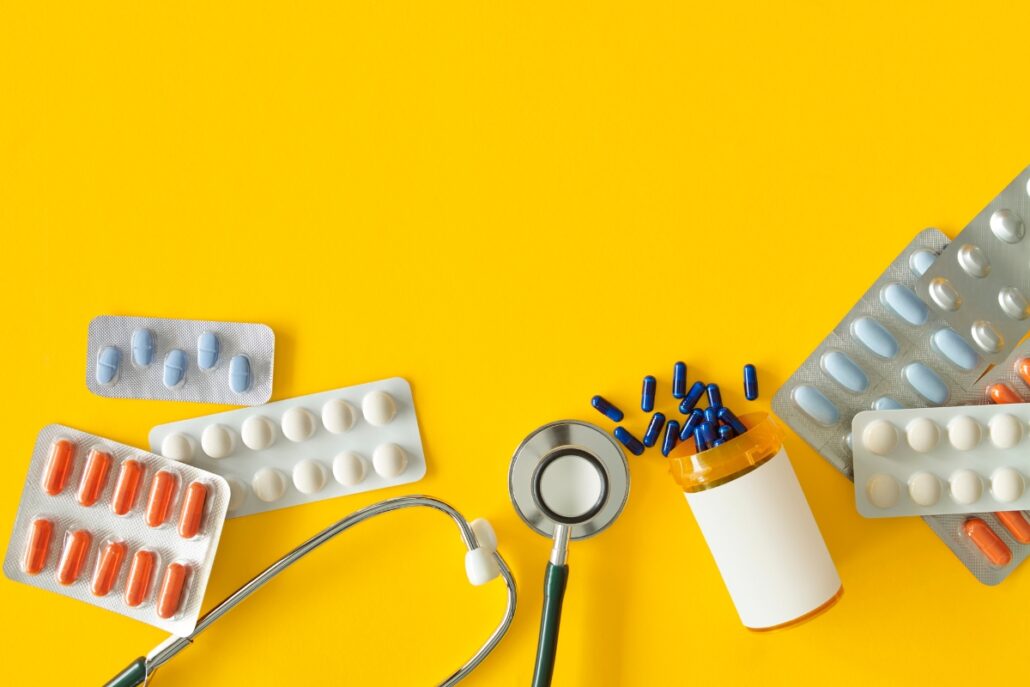 various pills and stethoscope