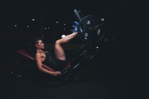 woman lifting with legs while sitting