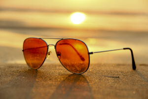 sunglasses standing up on beach