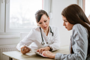 Doctor reviewing test results with patient