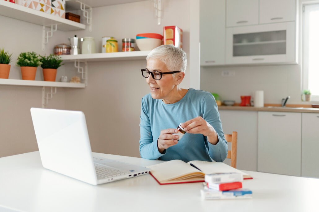 older woman doing virtual annual medication review through medicare